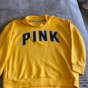 Pink sweatshirt.